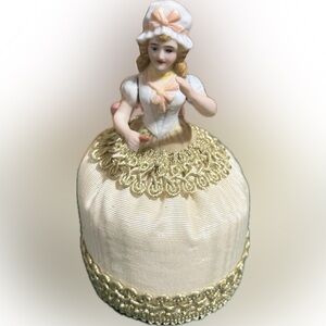 Charming Figurine with Gold Detailing
